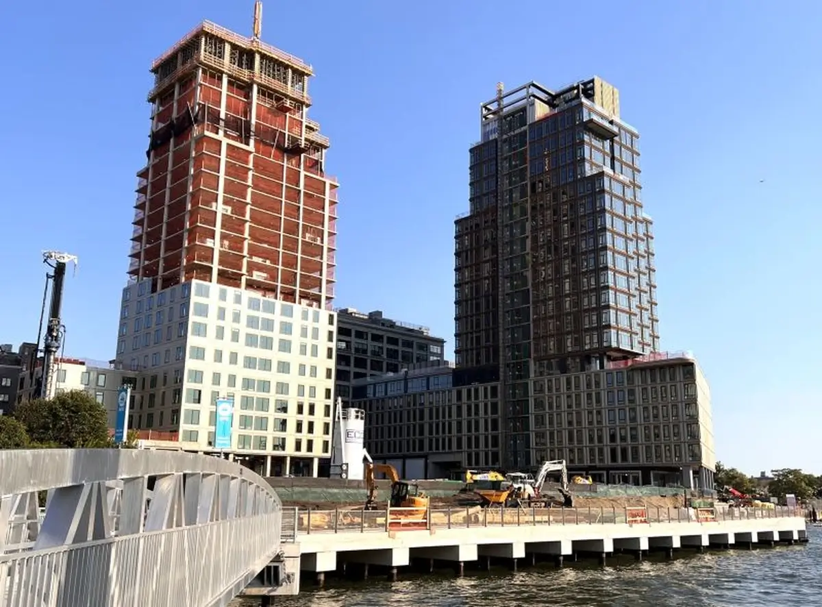 Side view of the 470 Kent Avenue building at the South Williamsburg waterfront, recently topped out