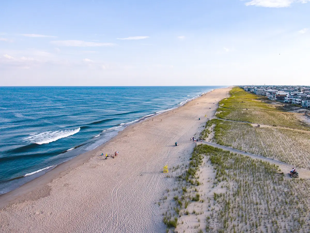 An Aerial View of New Jersey's Coastline, describing the articles insight into NJ's Plan to Combat Climate Change and the REAL Initiative